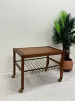 Small Danish Midcentury Teak Table with Magazine/Record Rack on wheels