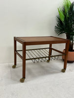 Small Danish Midcentury Teak Table with Magazine/Record Rack on wheels